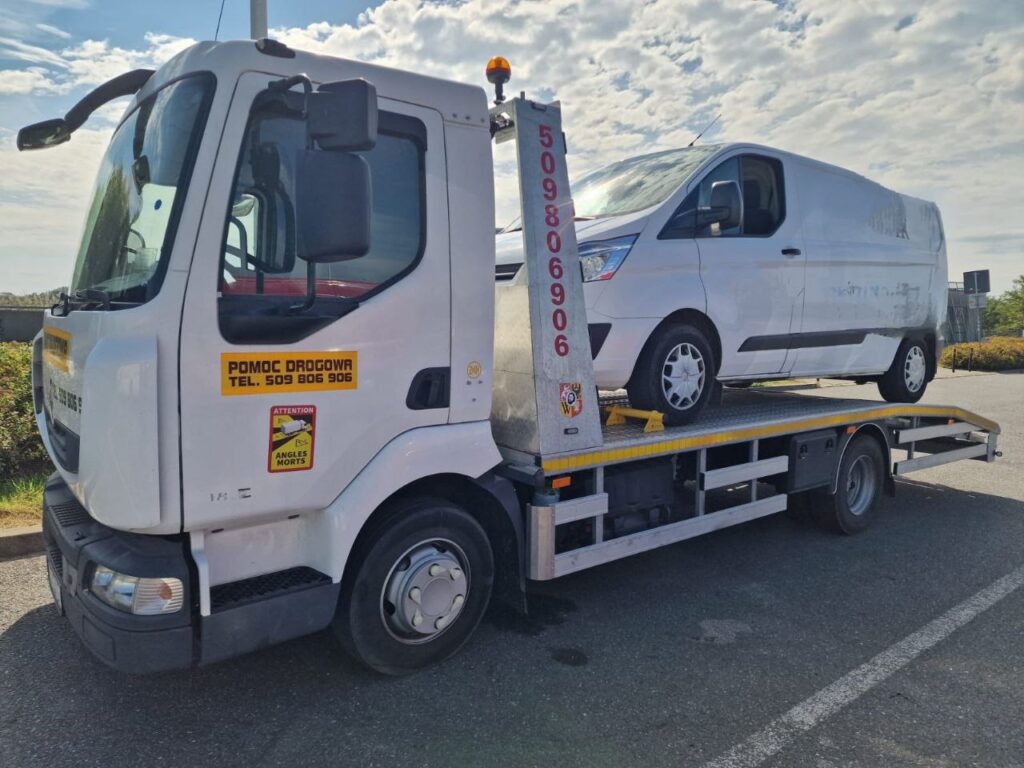 Pomoc drogowa Wrocław usługi - Husarz laweta transport auta dostawczego 24h